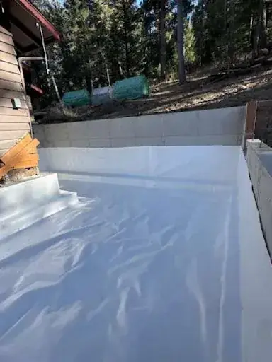 Crawl space inspected before vapor barrier installation